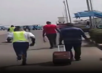 NIGERIA: Travellers run frantically to board a plane like it’s a Danfo