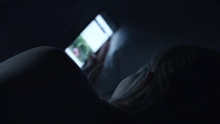 Using your phone before bed hijacks your sleep, but not for the reason you think