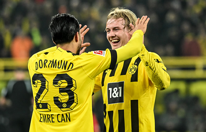 Dortmund put six past Cologne to top Bundesliga