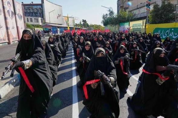 Thousands of Iranians rally in biggest show of defiance since war began…