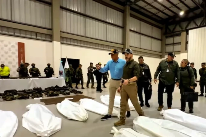 Colombia’s new president poses with dead bodies in show of force