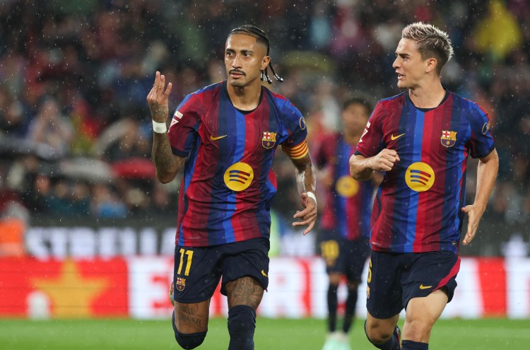 Barcelona 7-2 Racing Santander: Raphinha hat-trick fires leaders to sixth straight win