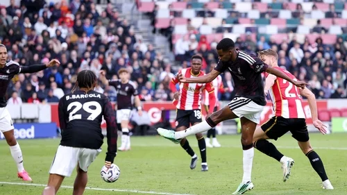 Liverpool fight back to beat nine-man Brentford as Isak scores winner