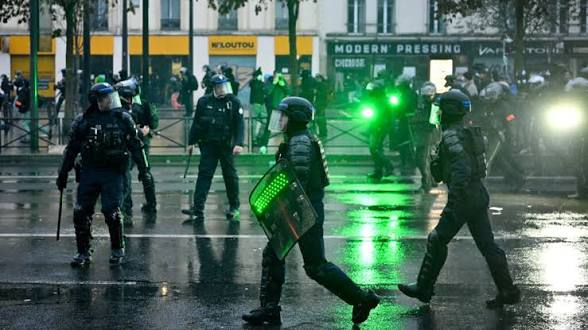 French police make nearly 1,000 arrests as protests turn violent nationwide